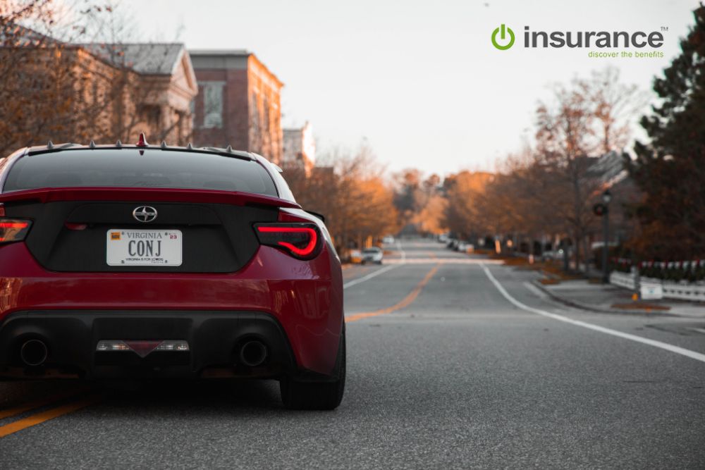 Red sports car on the road