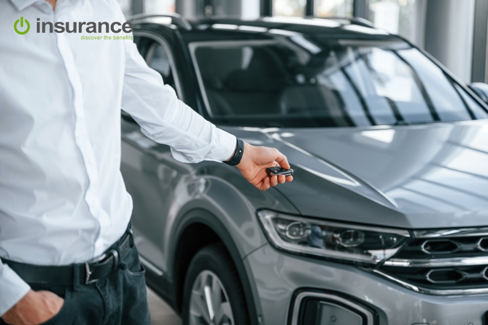 car owner with key in hand